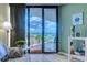 Balcony view showcasing seating and ocean vistas through large sliding glass doors at 9550 Shore Dr. # 225, Myrtle Beach, SC 29572