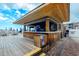Beach bar offers refreshments with ample seating and beachfront views under clear blue skies at 9550 Shore Dr. # 225, Myrtle Beach, SC 29572