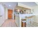 Galley kitchen with stainless appliances, tile floors, and breakfast bar at 9550 Shore Dr. # 225, Myrtle Beach, SC 29572