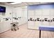 Well-equipped laundry room with rows of washers and dryers, with ample laundry carts available at 9550 Shore Dr. # 225, Myrtle Beach, SC 29572