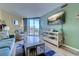 Cozy living room with beach decor, comfortable seating, and outdoor view at 9550 Shore Dr. # 225, Myrtle Beach, SC 29572