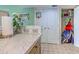 Convenient storage closet adjacent to the kitchen at 9550 Shore Dr. # 225, Myrtle Beach, SC 29572