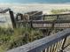 Wooden walkway leading to the beach, providing easy access to the ocean at 5732 N Ocean Blvd., Myrtle Beach, SC 29577