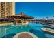 Relaxing pool bar with comfortable seating on the pool's edge and nearby lounge chairs at 100 North Beach Blvd. # 1816, North Myrtle Beach, SC 29582