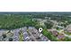 Scenic aerial view of a neighborhood with townhomes and mature trees at 108 Barnacle Ln. # 4, Little River, SC 29566