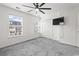 Bright bedroom featuring neutral carpet and natural light with lots of closet space at 108 Barnacle Ln. # 4, Little River, SC 29566