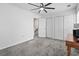 Bedroom features neutral carpet, ceiling fan, and access to closets for ample storage at 108 Barnacle Ln. # 4, Little River, SC 29566