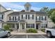 Inviting townhome with classic black shutters and covered front porch at 108 Barnacle Ln. # 4, Little River, SC 29566