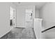 Bright hallway with neutral carpet and access to bathroom and living spaces at 108 Barnacle Ln. # 4, Little River, SC 29566