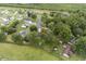 Aerial view of a neighborhood featuring mature trees and sprawling green spaces at 1100 Rosetta Dr., Conway, SC 29526