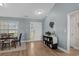 Welcoming entryway features a dining room table and storage at 1100 Rosetta Dr., Conway, SC 29526