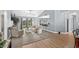 Open living space with kitchen bar, living room, and view to dining room at 1100 Rosetta Dr., Conway, SC 29526