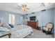 Spacious main bedroom featuring a neutral color palette, trey ceiling, and a large window at 1100 Rosetta Dr., Conway, SC 29526