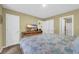 Comfortable bedroom featuring a queen-sized bed and a TV on a wooden dresser at 125 South Shore Dr. # 204, Longs, SC 29568