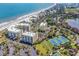 The aerial view captures an oceanfront condo community, offering tennis courts, pools, and beautiful views at 139 S Dunes Dr. # 304, Pawleys Island, SC 29585