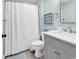 Bathroom with a shower/tub combo with a seashell-themed art print at 139 S Dunes Dr. # 304, Pawleys Island, SC 29585