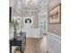 Welcoming entrance with elegant wainscoting and views into the home at 1459 Villena Dr., Myrtle Beach, SC 29579