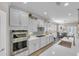 Gourmet kitchen featuring stainless appliances and a view of the dining area at 1459 Villena Dr., Myrtle Beach, SC 29579