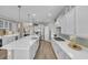 Spacious kitchen with a large center island, modern appliances, and white cabinetry at 1459 Villena Dr., Myrtle Beach, SC 29579
