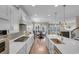 Open concept kitchen with modern finishes, a spacious island, and views of the backyard at 1459 Villena Dr., Myrtle Beach, SC 29579