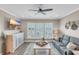 Inviting living room with lake views, ceiling fan, and open concept layout at 1459 Villena Dr., Myrtle Beach, SC 29579