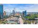 Aerial view of downtown with Aqua Beach Inn, Ferris wheel, and the city skyline in the background at 1700 N Ocean Blvd. # 651, Myrtle Beach, SC 29577