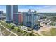 A scenic aerial shot of oceanfront condo buildings with pools, parking, and beach access at 1700 N Ocean Blvd. # 651, Myrtle Beach, SC 29577