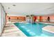 Bright indoor pool area with a waterfall and decorative statues at 1700 N Ocean Blvd. # 651, Myrtle Beach, SC 29577
