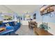 Spacious living room with ample seating and tile flooring, connected to the kitchen and dining area at 1700 N Ocean Blvd. # 651, Myrtle Beach, SC 29577