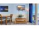 Bright living space with tile flooring, a dining table, and access to a private balcony at 1700 N Ocean Blvd. # 651, Myrtle Beach, SC 29577