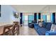 Comfortable living and dining area leading to a balcony with ocean views at 1700 N Ocean Blvd. # 651, Myrtle Beach, SC 29577