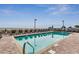 Outdoor swimming pool surrounded by lounge chairs and a beautiful ocean view at 1700 N Ocean Blvd. # 651, Myrtle Beach, SC 29577