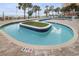 Unique winding community pool featuring turfed islands for sunbathing at 1700 N Ocean Blvd. # 651, Myrtle Beach, SC 29577