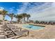 Relaxing resort pool and lounge area with palm trees overlooking the ocean at 1700 N Ocean Blvd. # 651, Myrtle Beach, SC 29577