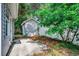 This backyard features a storage shed, concrete patio, and a privacy fence at 1836 Juniper Dr., Conway, SC 29527