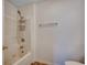 Clean bathroom with tub and shower combination, complemented by neutral wall and tile finishes at 1836 Juniper Dr., Conway, SC 29527