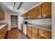 Functional kitchen with wood cabinets, essential appliances, and a convenient layout for cooking and storage at 1836 Juniper Dr., Conway, SC 29527