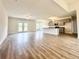 Spacious living area with hardwood floors, a ceiling fan, and French doors to backyard at 189 Norris Ln, Loris, SC 29569
