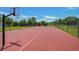 Spacious community basketball court featuring two hoops, surrounded by greenery, and providing a great recreational space at 1941 La Playa Dr., Myrtle Beach, SC 29588