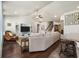 Open-concept living area featuring a media center, staircase, and view of the kitchen at 1941 La Playa Dr., Myrtle Beach, SC 29588