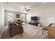 Comfortable living room with plush sofas, neutral carpet, and a ceiling fan at 1941 La Playa Dr., Myrtle Beach, SC 29588