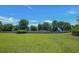 Open community playground area with swings, slides, and climbing structures, surrounded by green space at 1941 La Playa Dr., Myrtle Beach, SC 29588