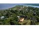 Scenic aerial view of the property nestled amongst the trees near the waterway at 208 Prince St., Georgetown, SC 29440