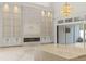 Living room area features a fireplace, shelving, and sliding glass doors at 212 78Th Ave. N, Myrtle Beach, SC 29572
