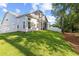 A lovely backyard with a screened in porch, a privacy fence, and luscious grass at 212 Starlit Way, Myrtle Beach, SC 29579