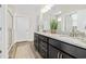 Bathroom with double vanity, granite countertops, modern fixtures and glass enclosed shower at 212 Starlit Way, Myrtle Beach, SC 29579