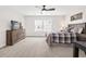 Cozy bedroom with neutral tones, a wooden dresser, and a comfortable bed at 212 Starlit Way, Myrtle Beach, SC 29579