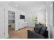Comfortable sitting area with two gray armchairs and an adjacent bunkbed bedroom beyond at 2308 Seaseeker Ln., Myrtle Beach, SC 29577