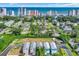 Scenic aerial view showcasing oceanfront buildings and neighborhoods, with tree lined streets at 2310 Seaseeker Ln., Myrtle Beach, SC 29577