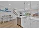 Open concept space featuring kitchen, stairs and dining area at 2310 Seaseeker Ln., Myrtle Beach, SC 29577